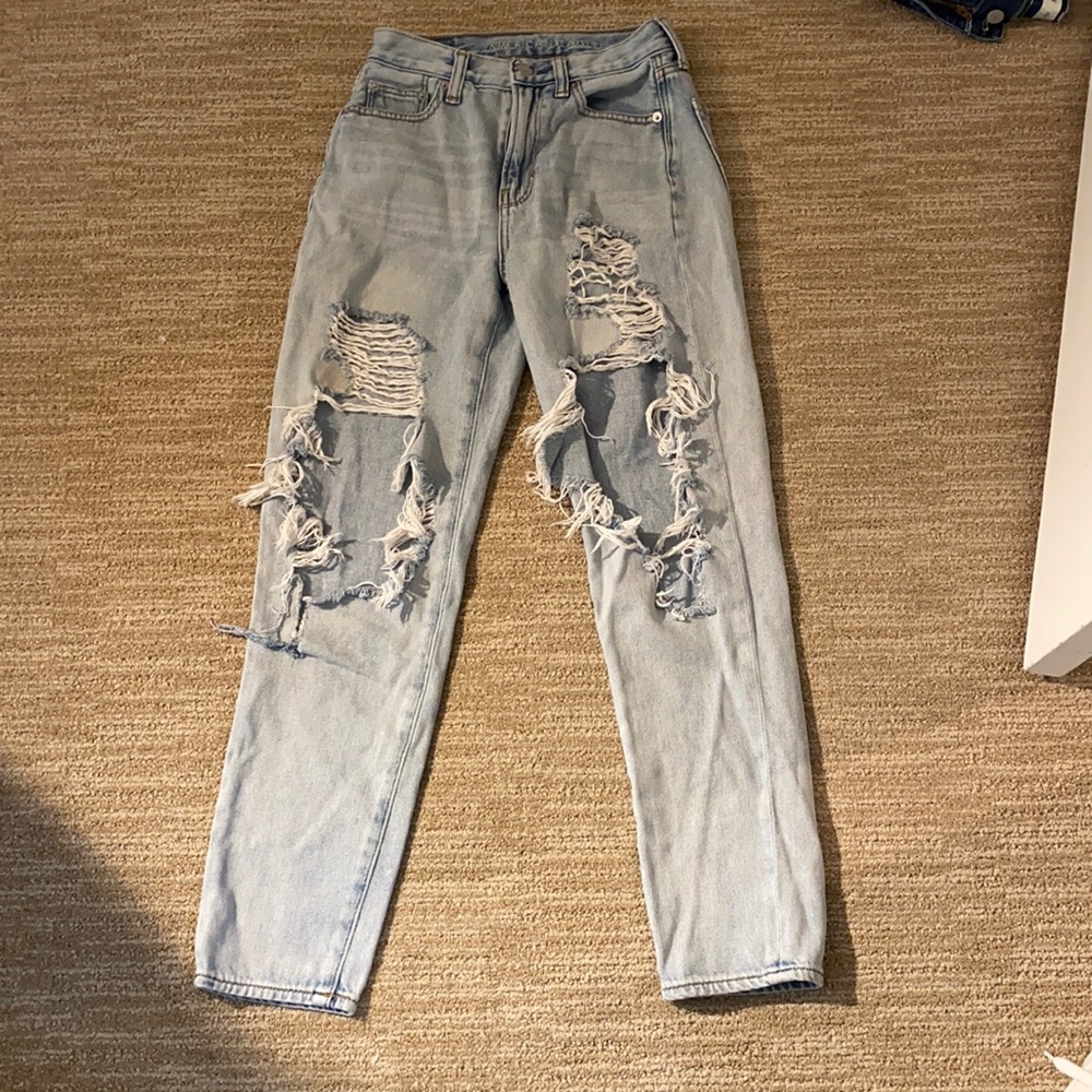 AE ripped high waist light wash mom jeans
